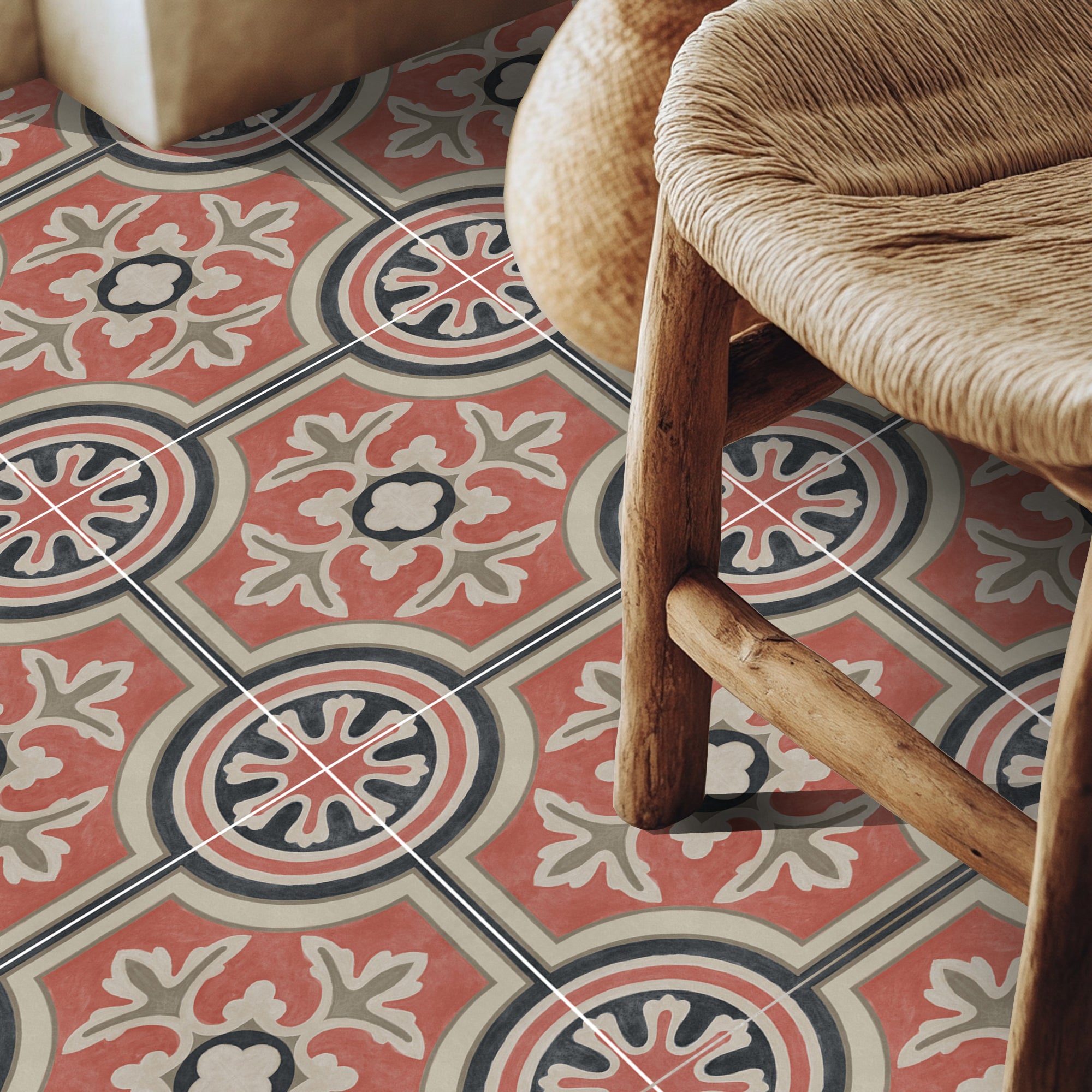 a wooden chair sitting on top of a tiled floor
